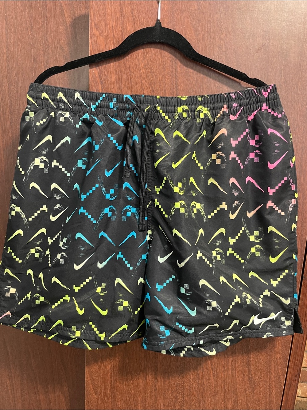 Nike Men’s Black Athletic Shorts with Multicolor Swoosh Print
